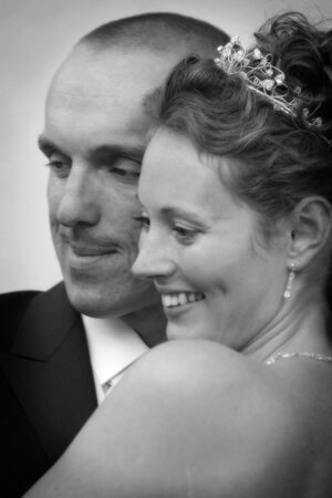 Close up reportage wedding photograph of bride and groom