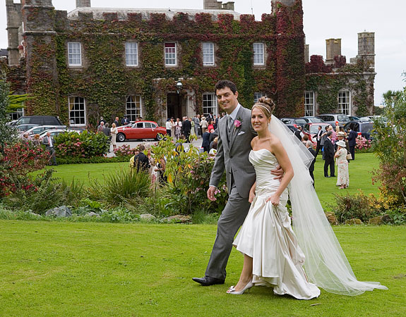 wedding photograph with wedding venue at St Ives, Tregenna Castle by wedding photographers Shah Photography